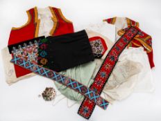 Two Norwegian Dress Costumes comprising;- headdress, waistcoat, blouses, skirts and accessories,