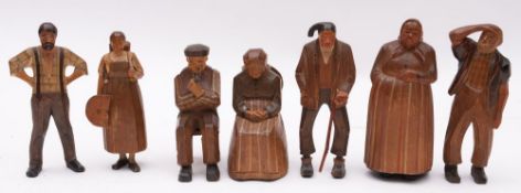 A group of seven Tyrolean carved wood figures of villagers,