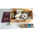 A collection of mixed world coins including Swiss and Italian, two 1970 proof sets,