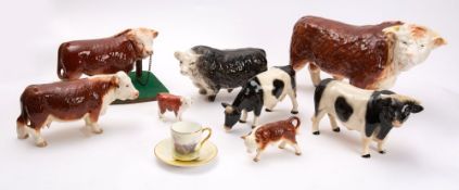 Cattle, Melbaware Hereford bull,15cm height and seven other pottery cattle figures,