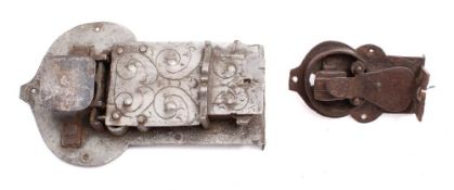 A large steel chest lock, probably 18th century: with scroll chased backplate, 22cm long,