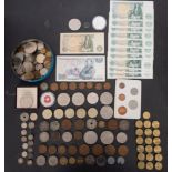 A quantity of assorted world coins including silver bank notes, first day covers, etc.
