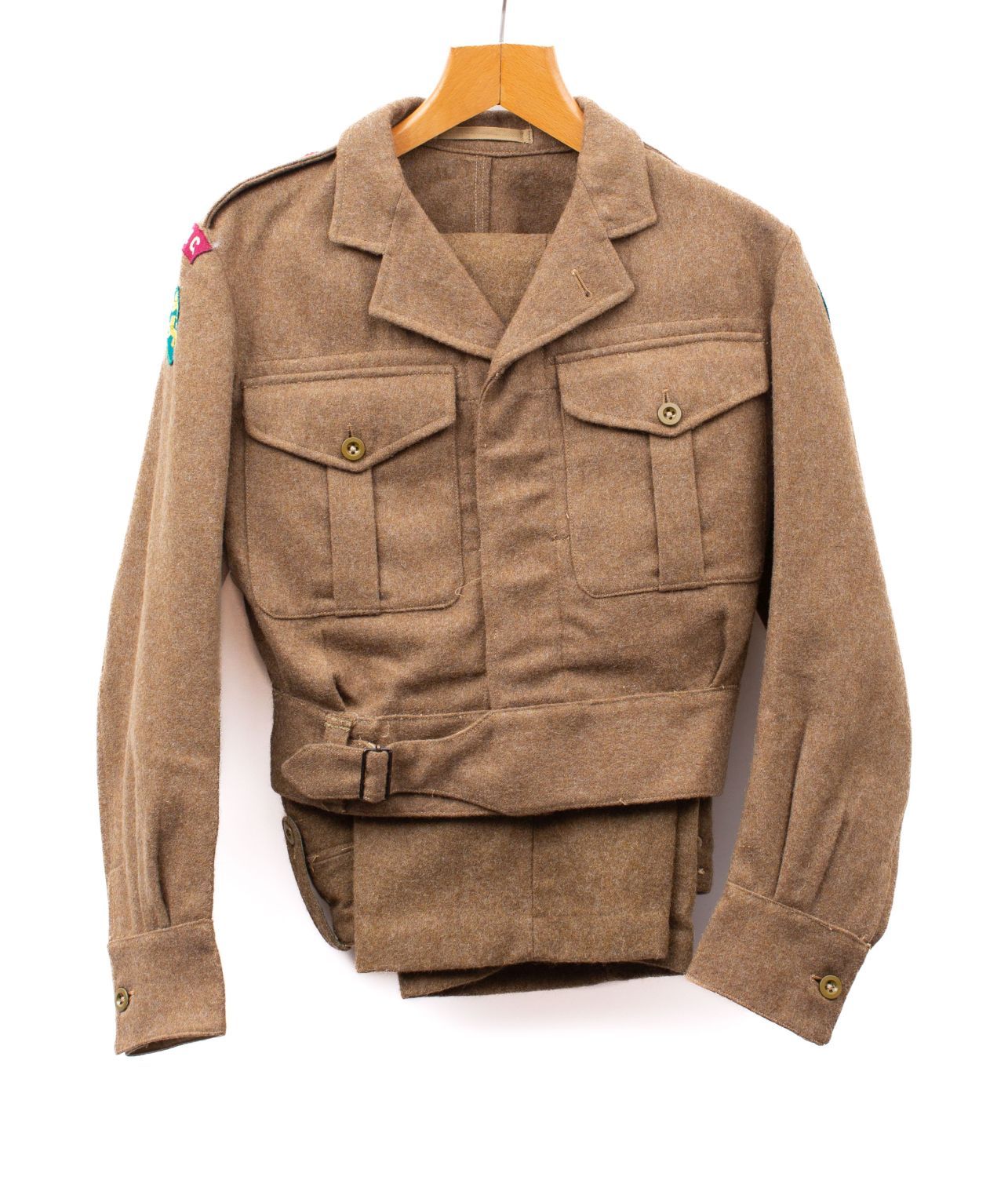 A post war 1949 pattern RAMC battle dress blouse and trousers, the blouse by S R Goldman, London,