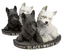 Two 'Black & White' Scotch Whisky' Advertising figures of small size, 21cm high.