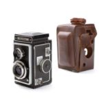 A Zeiss Ikon 'Ikonflex' twin lens reflex camera in leather case, fitted Tessar 75mm f 1;3.5 lens .