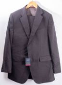 A Charles Tyrwhitt charcoal slim fit birds eye three piece suit, the jacket 42 regular,