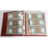 A mixed album of world banknotes, including USA, Russia, Germany ,