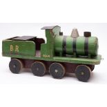 A scratch built wooden steam outline 2-4-2 locomotive in BR green No.