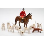 Beswick Huntsman model 1501, brown colourway; together with eight hounds and fox.