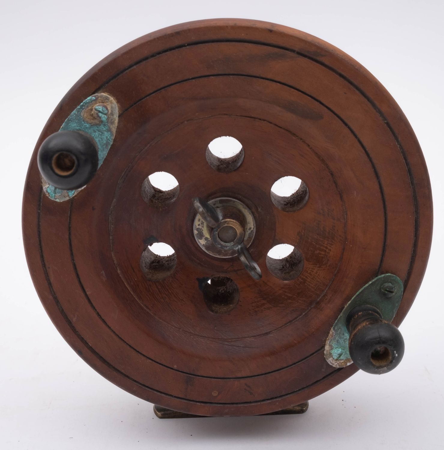 A late 19th century mahogany and brass star back reel, with double horn handles, - Image 3 of 6