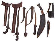 Two Malayan Kris, in wooden scabbards, together with two Indian Kinjal style knives,