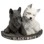 A large 'Black & White' Scotch Whisky' Advertising figure, 58cm high,