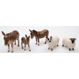 Beswick Donkey and two Foals; together with Black Faced Ram and Uwe.