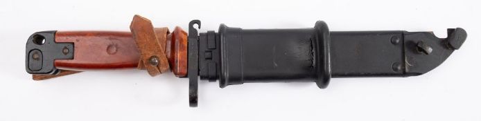 An AK47 bayonet with scabbard, stamped '2341'.