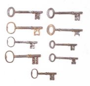Nine various 19th century and later English steel keys: (9)