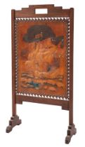 An embossed and painted leather and oak fire screen,