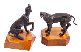 A pair of patinated metal models of hounds, second half 20th century; naturalistically portrayed,