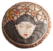 An embroidered and silk circular cushion, probably French,