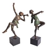 A pair of Continental cold painted spelter models of a Bacchic youth and a Bachante,