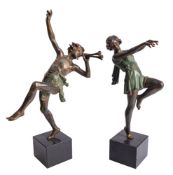 A pair of Continental cold painted spelter models of a Bacchic youth and a Bachante,