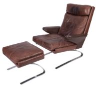 A pair of German leather upholstered 'Swing' lounge chairs with foot stools,
