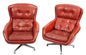 A pair of Swedish red faux leather upholstered swivel tub chairs, by Stefa,