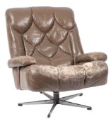 A leather upholstered lounge swivel chair,