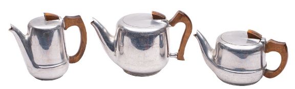 A mid 20th Century Picquot Ware teapot, another of a slightly different design and a hotwater pot,