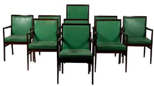 A set of nine mahogany and faux leather upholstered elbow chairs,