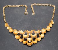 A Modernist, 18ct gold, round, brilliant-cut diamond and round, mixed-cut sapphire necklace,