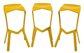 A set of three contemporary Miura green plastic bar stools,