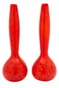 A pair of hand blown studio glass vases, of globular form with slender swelling neck,