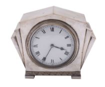 An Art Deco mantel timepiece with white enamel dial, in plated 'sunburst' case, 1930s. 17cm wide.