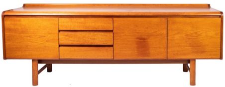 A teak sideboard, circa 1960s; the top with raised back edge and moulded front,