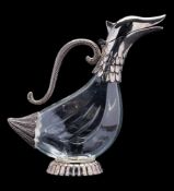 A clear glass and white metal mounted anthropomorphic decanter, in the form of a bird, 26cm high.
