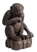 A painted resin model of an ape, by Les Jewell, modern; portrayed as seated on its haunches,