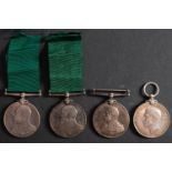 Four Royal Naval Reserve Long Service and Good Conduct Medals.