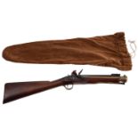 A 19th century brass-barrelled flintlock blunderbuss by Wheeler & Son,