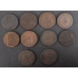 Ten copper 18th Century trade tokens.