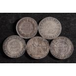 Five 19th Century silver shilling tokens including Swansea, Nantwich, Bilston,