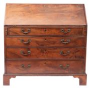 A George III mahogany bureau, circa 1770; the fall front opening to a fitted interior with drawers,
