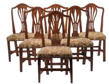 A matched set of six George III hardwood and upholstered dining chairs,