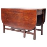 A mahogany drop leaf dining table in Sutherland style,