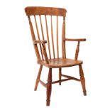 An ash, beech and oak spindle back elbow chair,