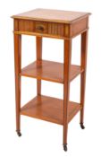 An Edwardian satinwood and inlaid square three-tier whatnot/bedside table,