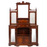 A Victorian walnut side cabinet, the stepped mirror back set on a base with raised centre,