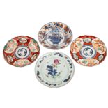 Three Oriental porcelain plates, comprising a Chinese famille rose example,