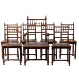 A set of seven Victorian oak dining chairs in Aesthetic Movement taste,