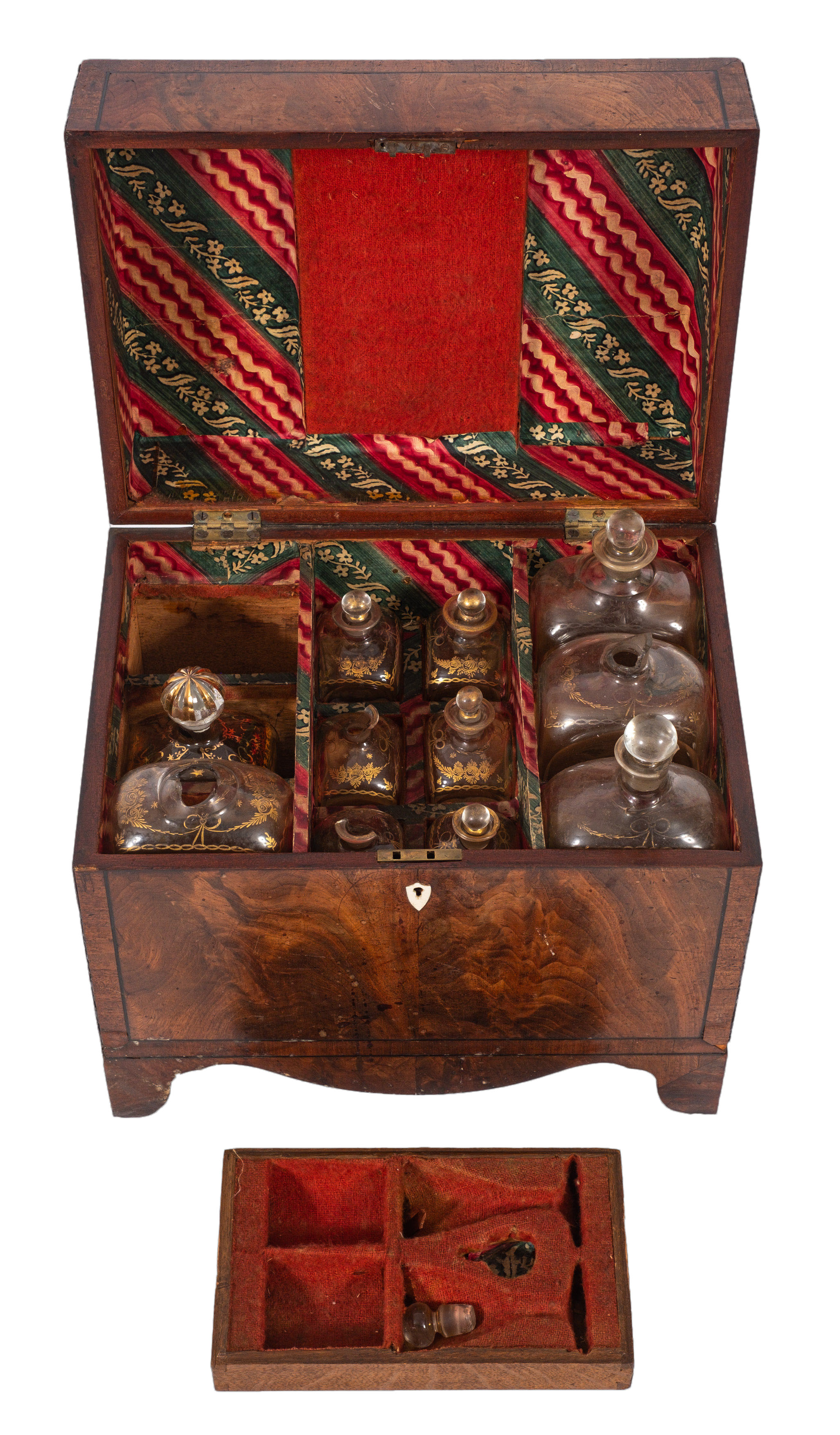 A George IV mahogany box decanter, of rectangular form, decorated with ebony stringing,