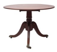 A George III mahogany circular breakfast table,